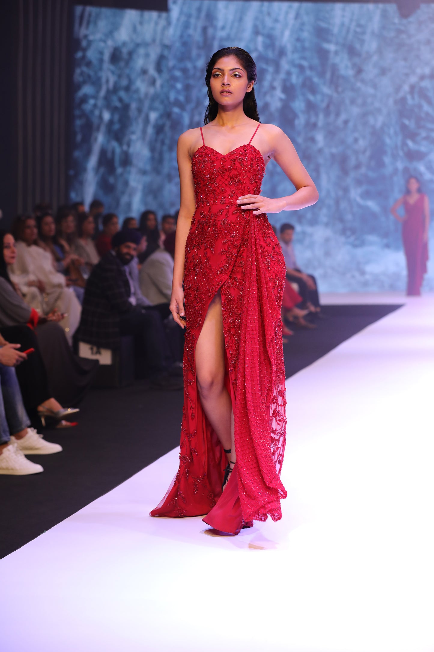 Red Embellished Gown With Side Trail
