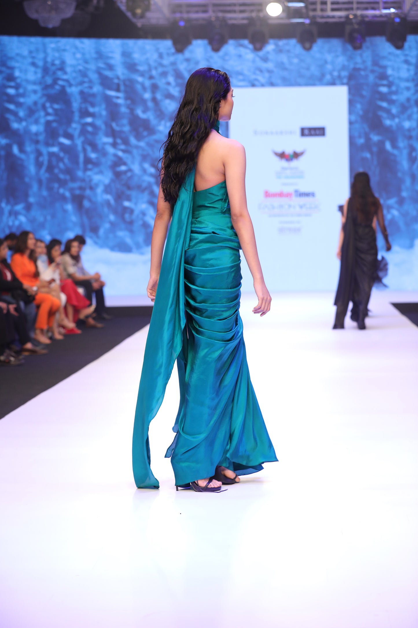 Draped gown with waist embellishment