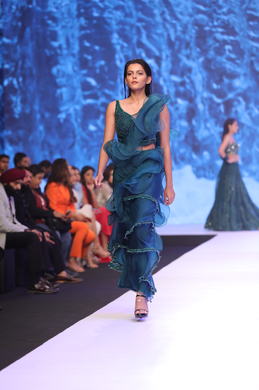 Ruffle saree with emb blouse