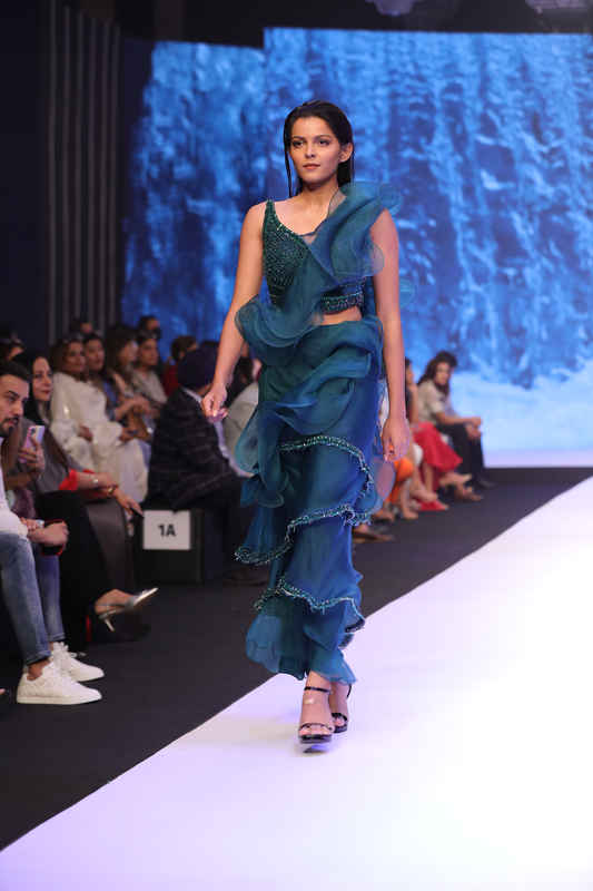 Ruffle saree with emb blouse