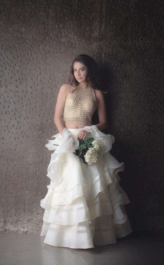 Ruffle layered skirt paired with honeycomb blouse and ruffle dupatta