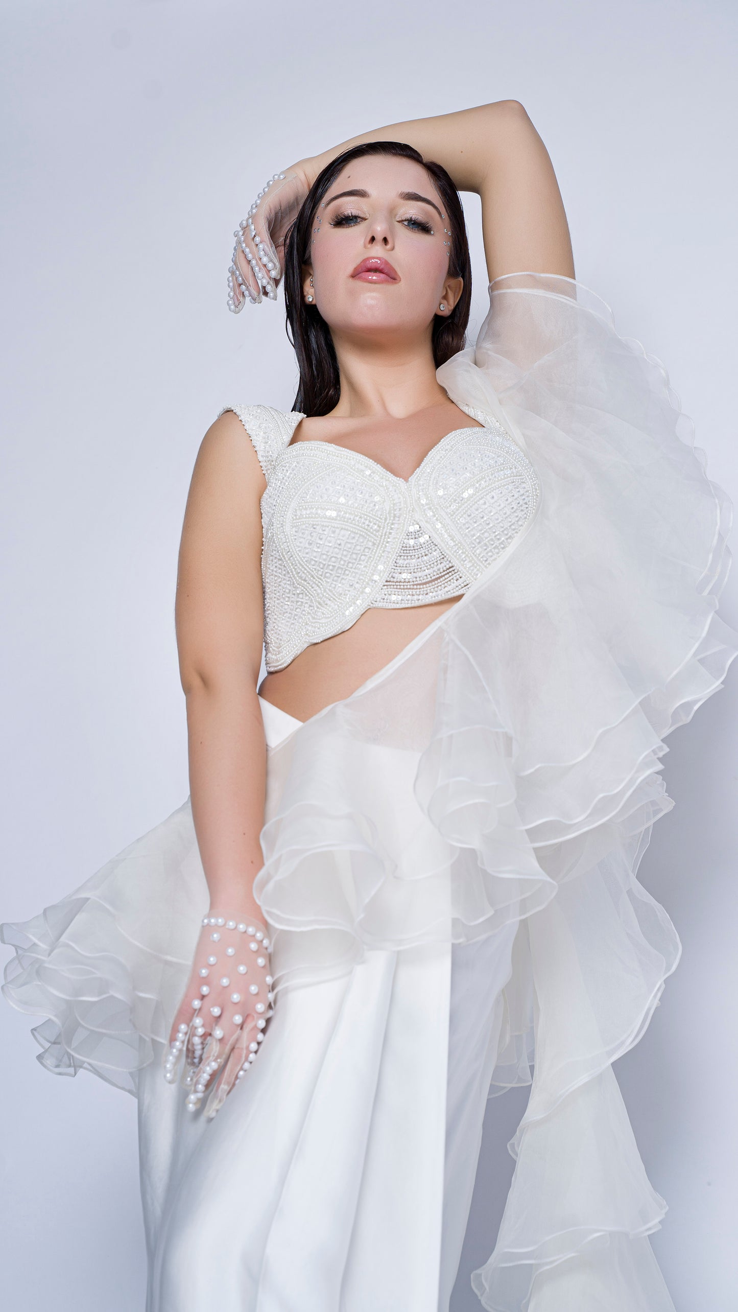 Pearl embellished blouse with organza ruffled draped gown