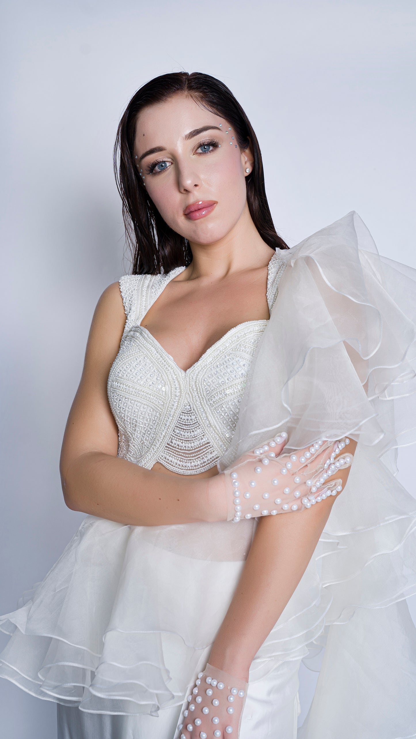 Pearl embellished blouse with organza ruffled draped gown