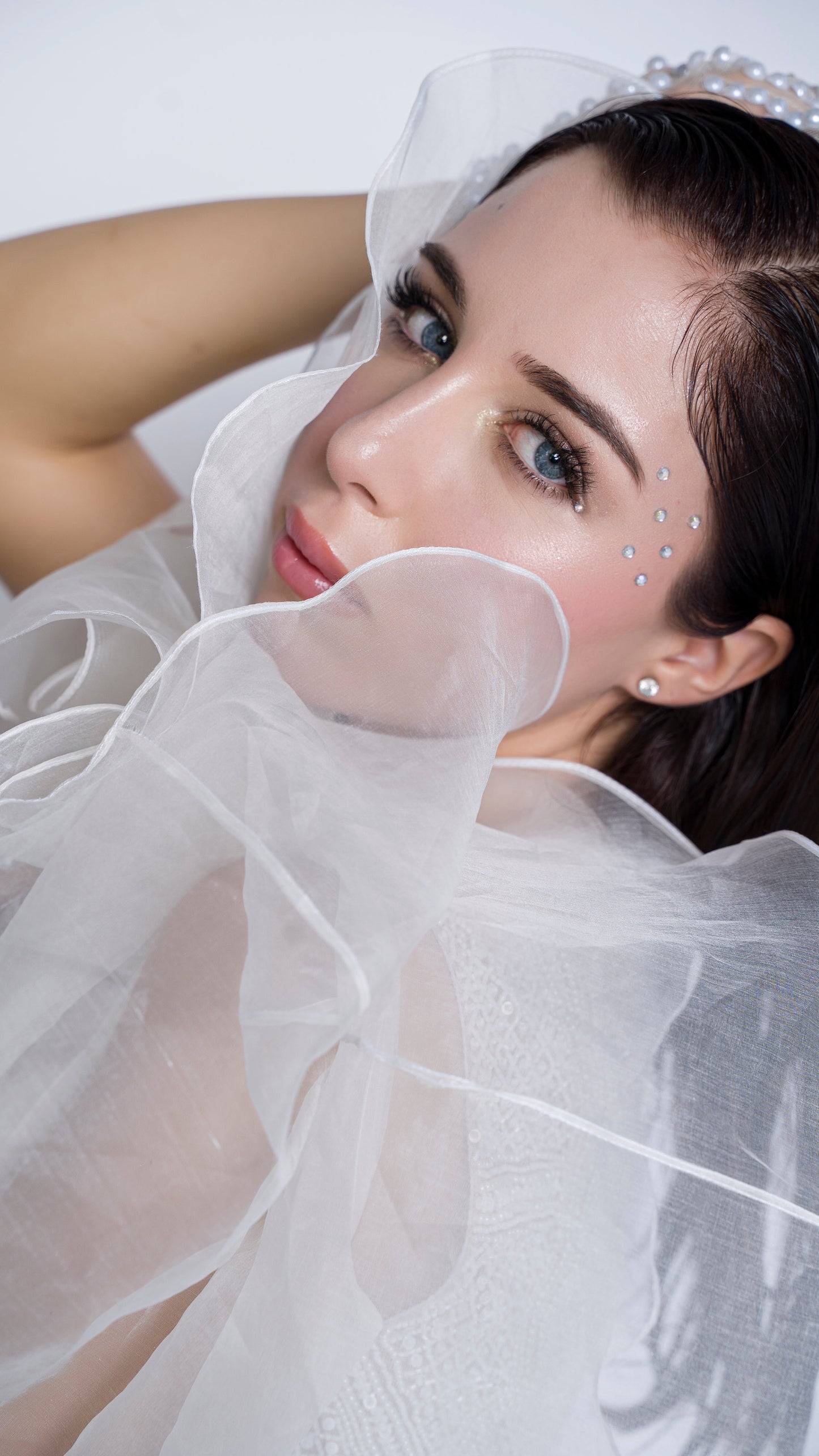 Pearl embellished blouse with organza ruffled draped gown