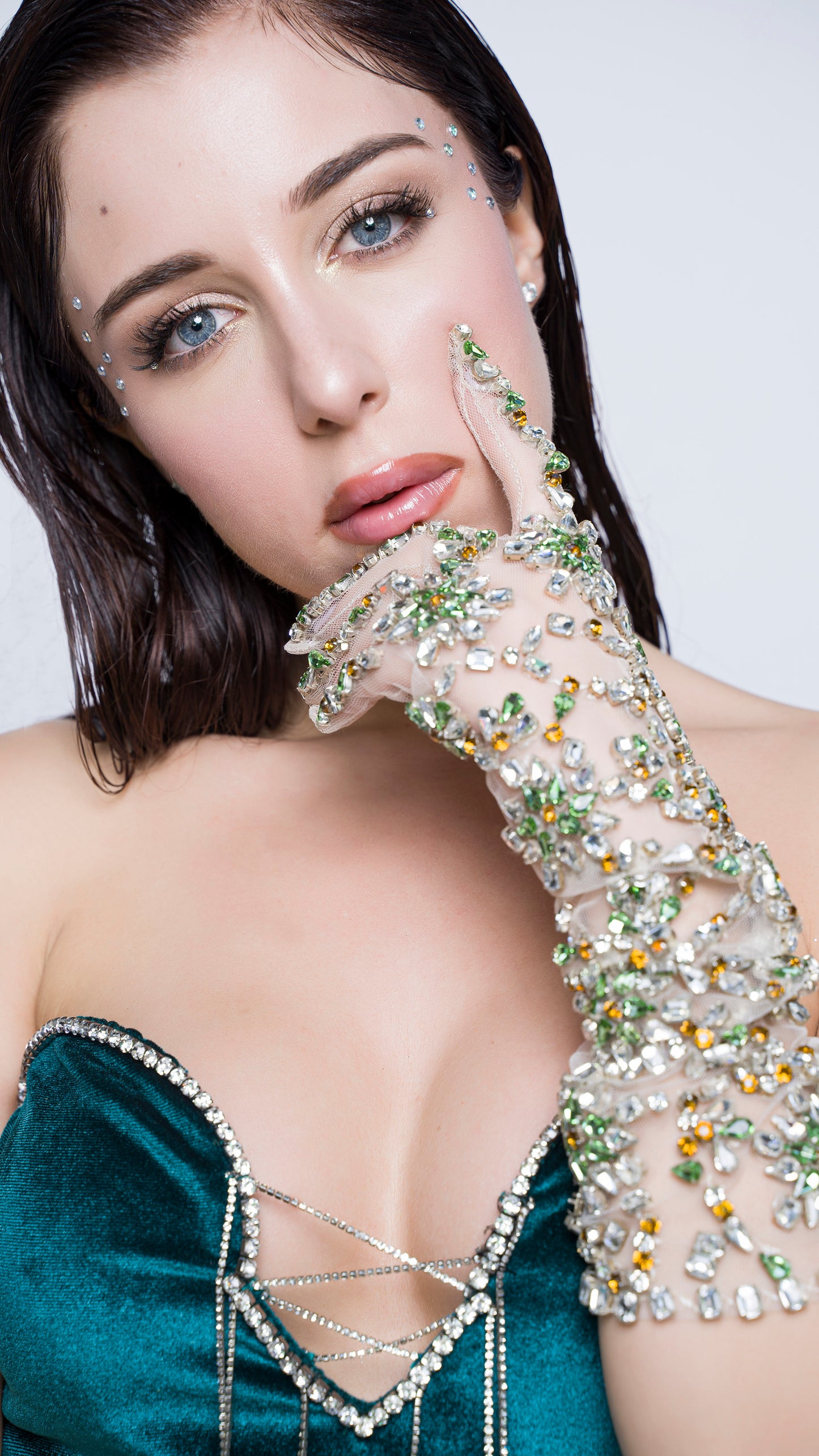 Teal green strapless velvet gown with crystal chainmail