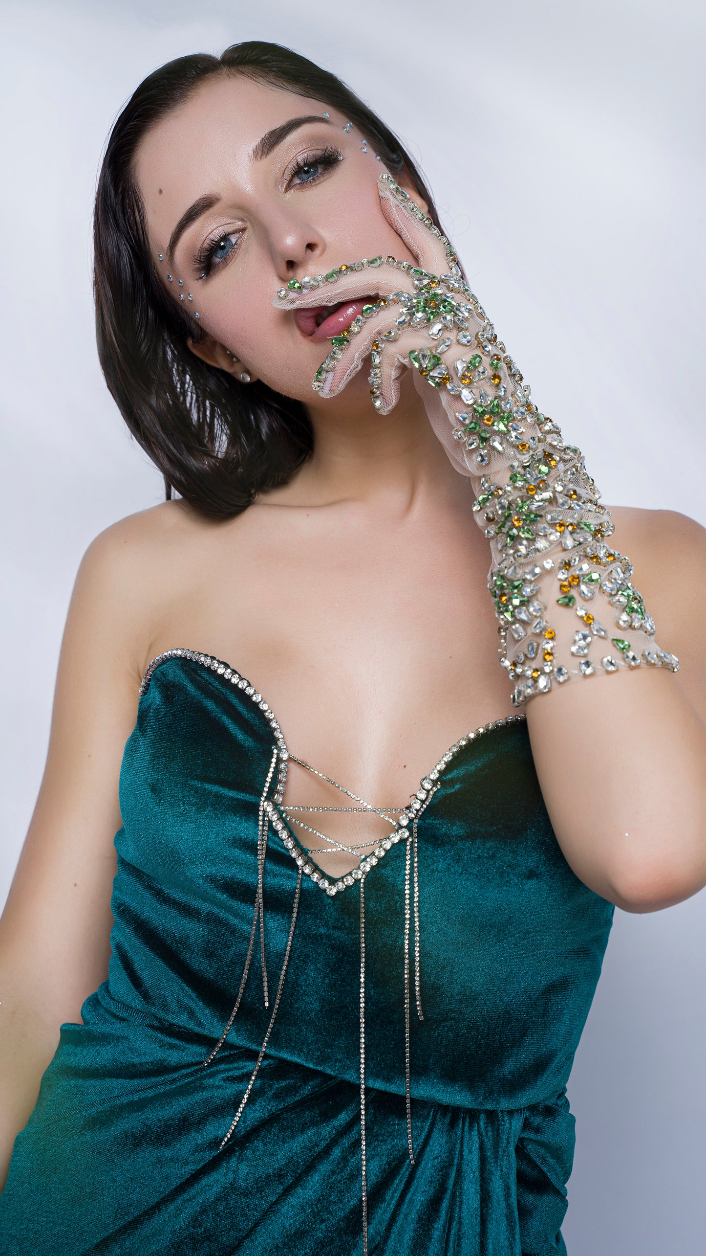 Teal green strapless velvet gown with crystal chainmail