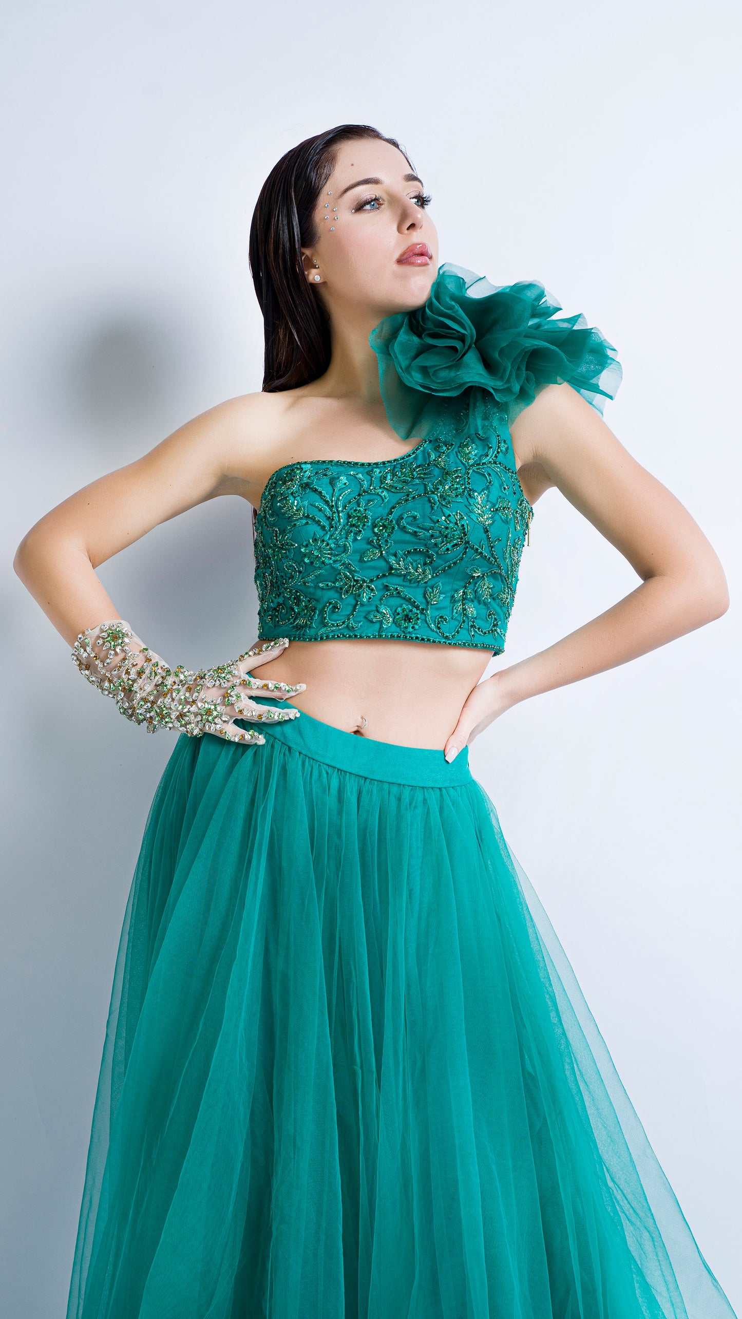 Teal green one shoulder rose embroidered lehenga set