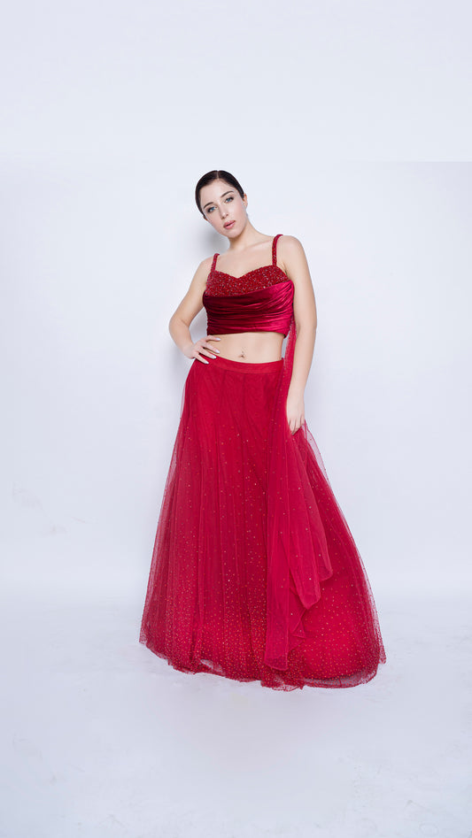 Red encrusted cowl drape blouse with crystal splatter lehenga set