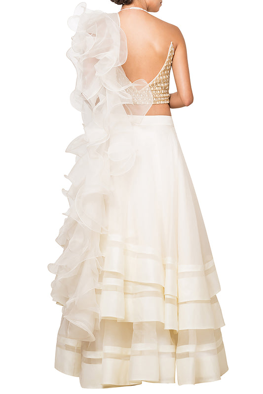Ruffle layered skirt paired with honeycomb blouse and ruffle dupatta
