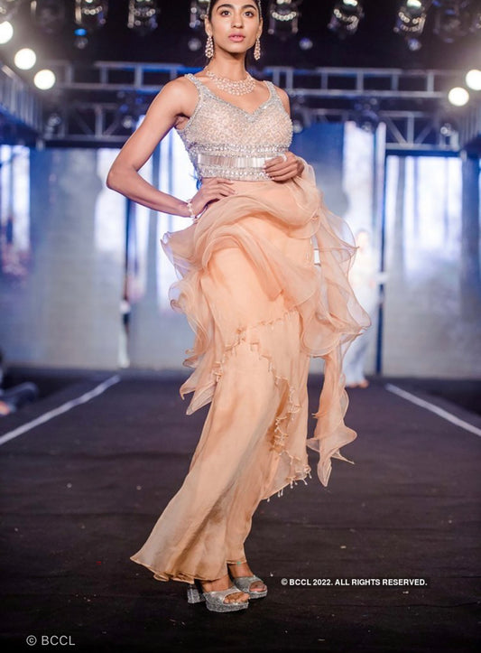 Ruffle saree gown paired with encrusted blouse