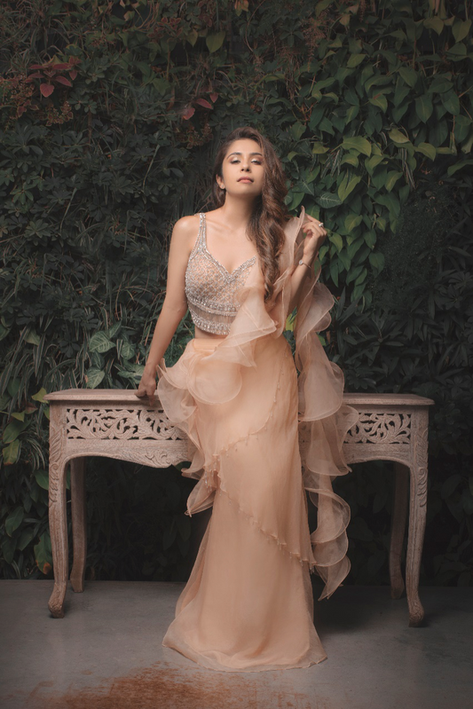 Ruffle saree gown paired with encrusted blouse