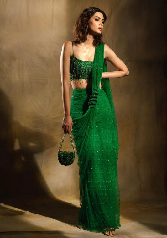 Diana Penty in Oleina- Emerald green embroidered saree gown with serpentine belt