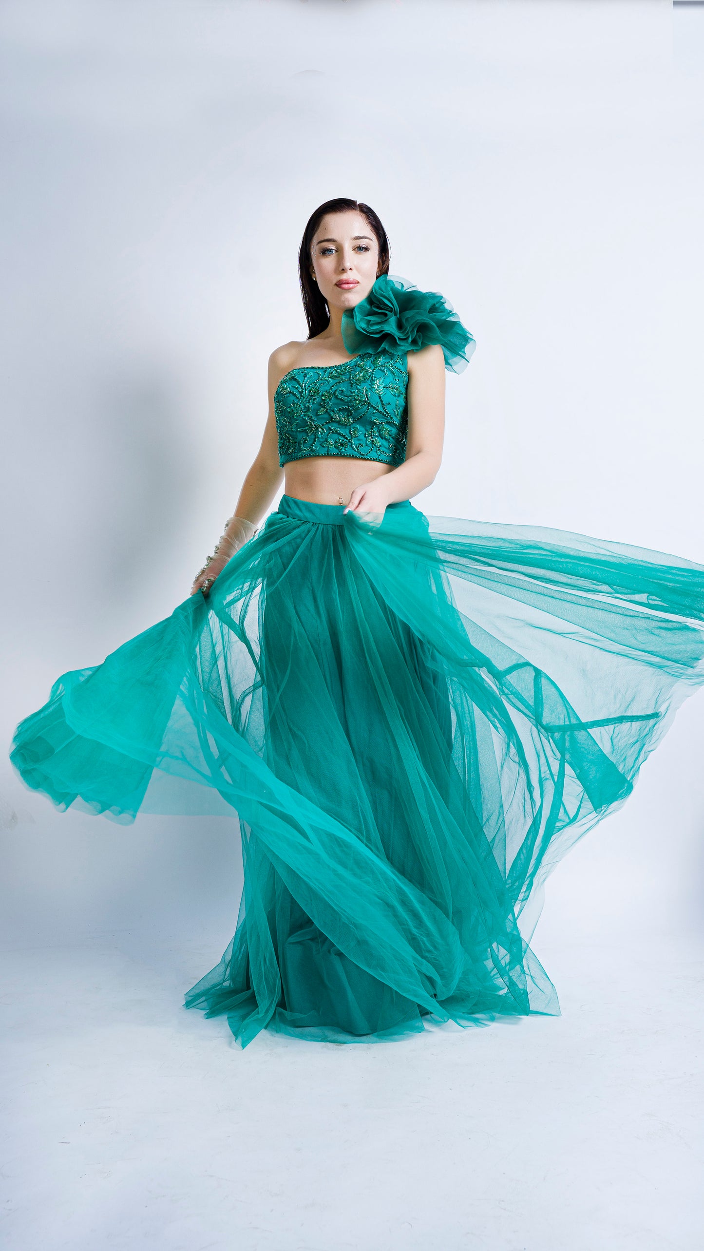 Teal green one shoulder rose embroidered lehenga set