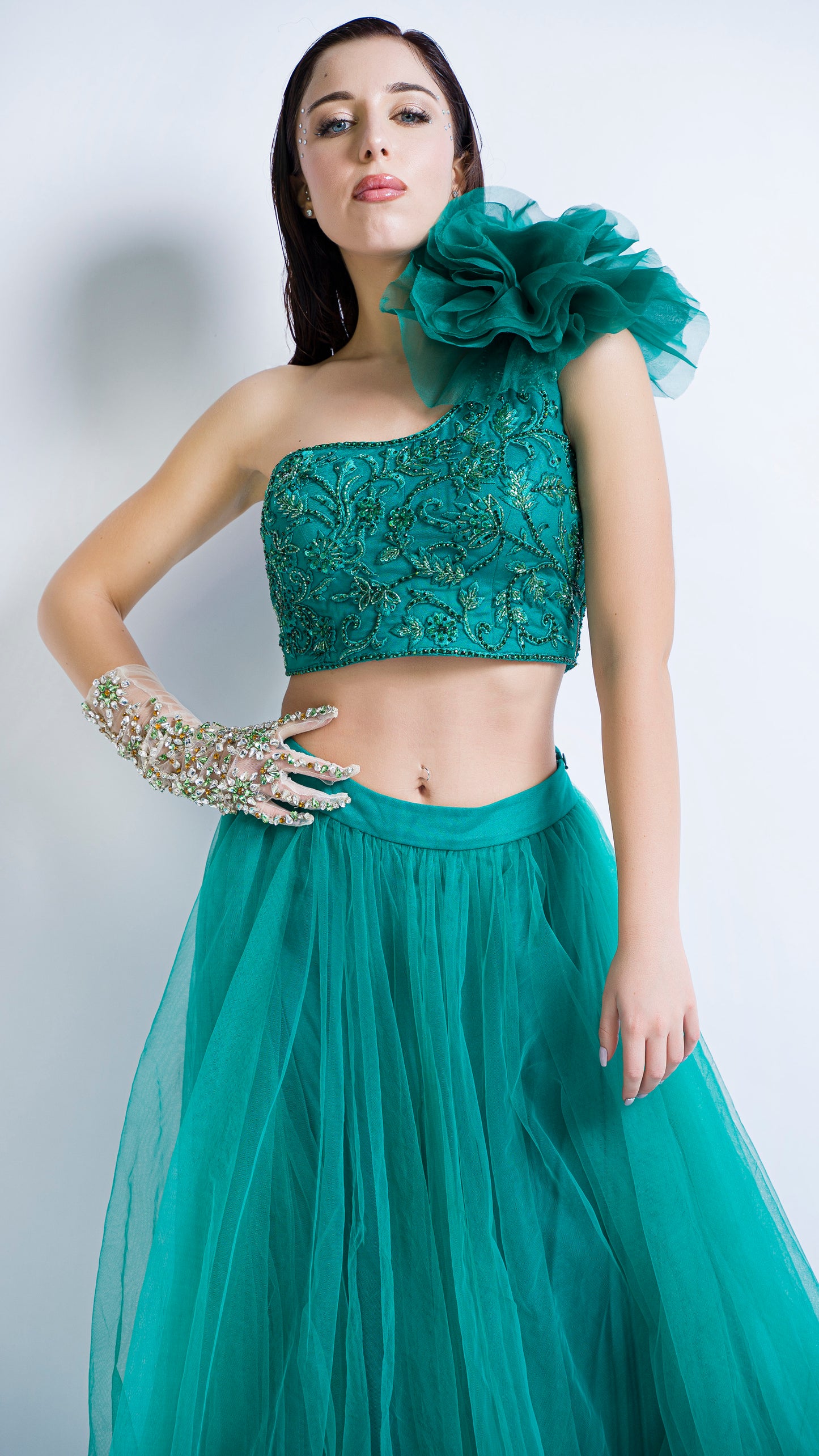 Teal green one shoulder rose embroidered lehenga set