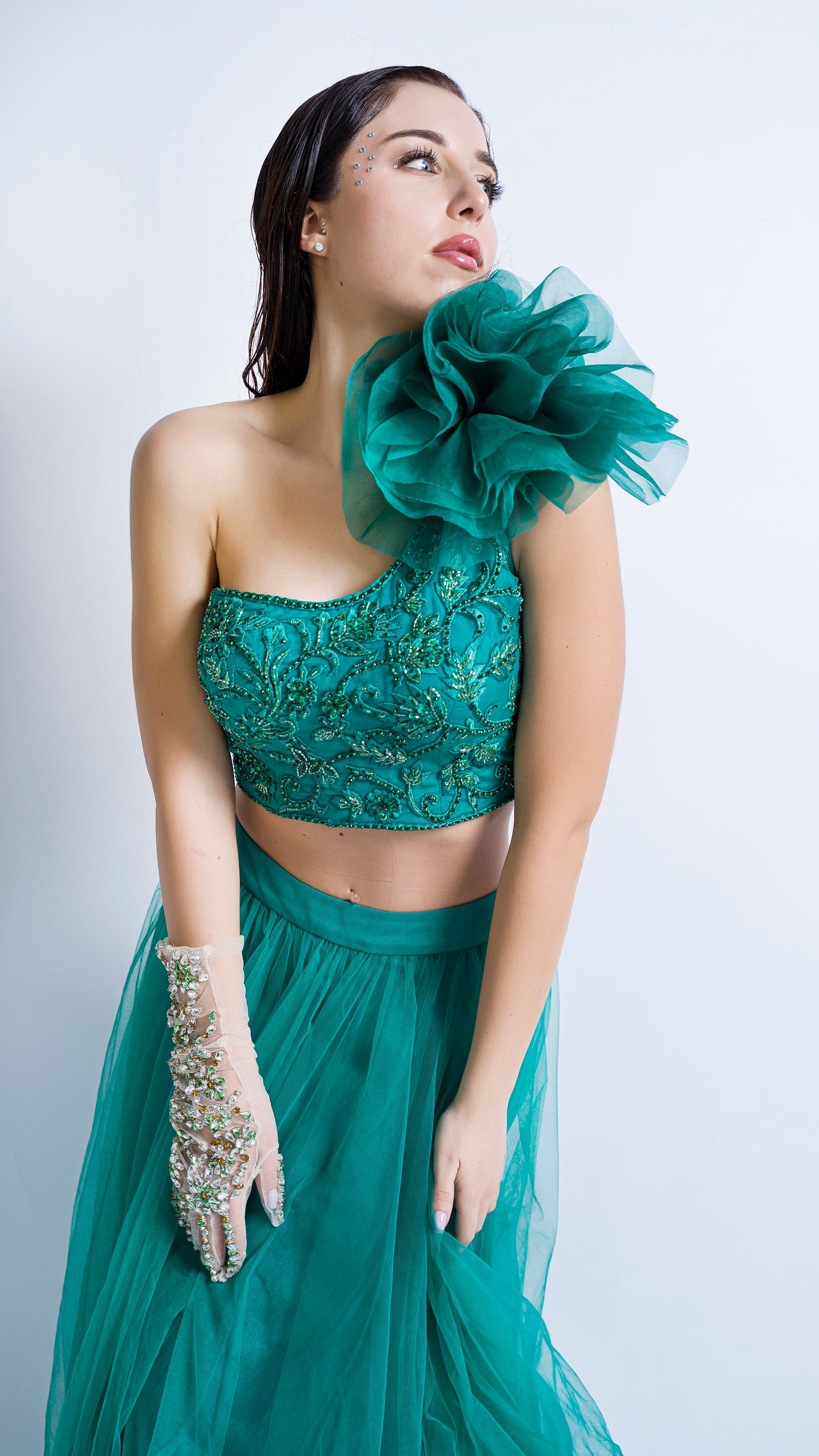 Teal green one shoulder rose embroidered lehenga set